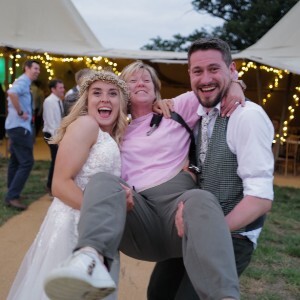 Emma J smith photographer at Beautifullight photography being picked up by a bride & groom on their wedding day