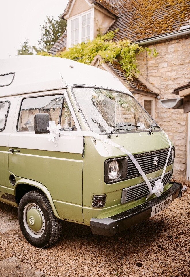 vintage volkswagon van dressed as wedding car 