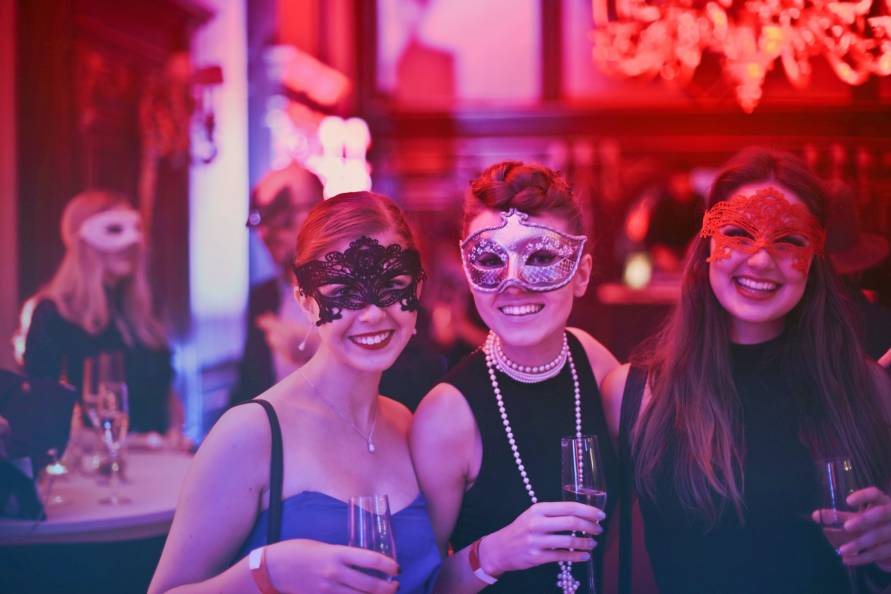 Women with masks on enjoying a hen party