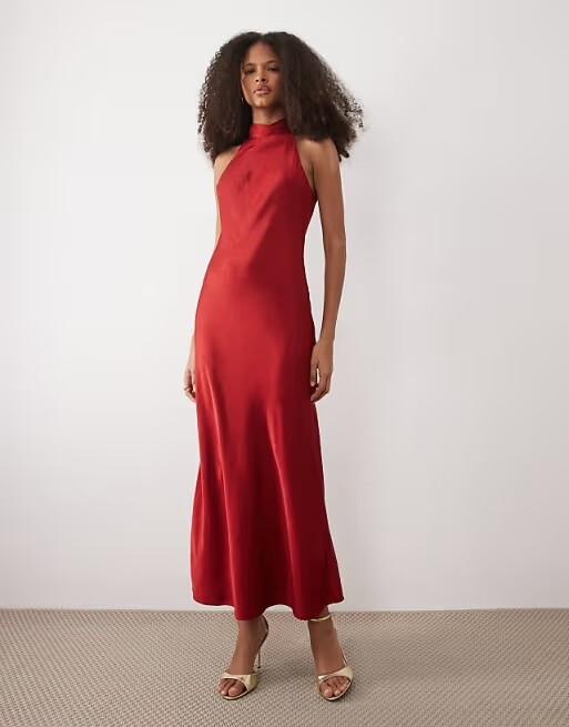 red satin halterneck bridesmaid dress with tie back and full length skirt for winter wedding