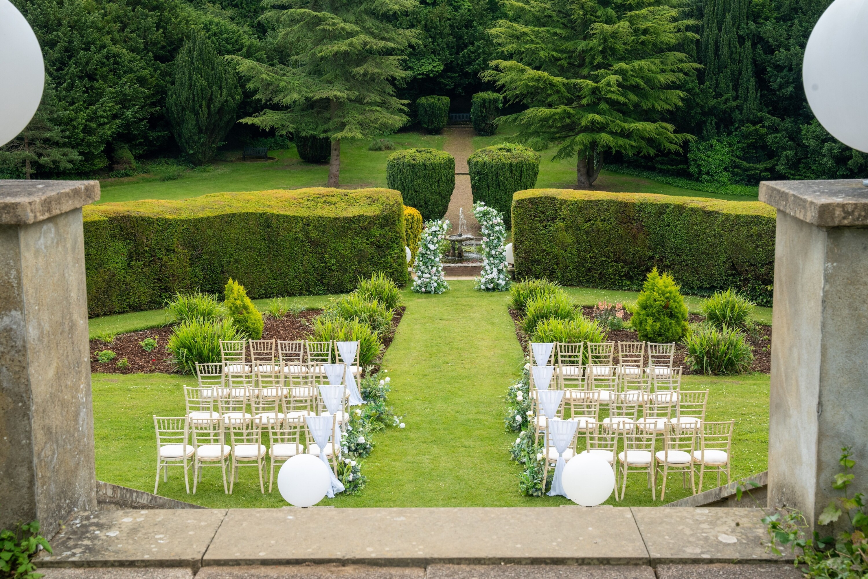 An outdoor ceremony set up at Hunton Park Wedding venue