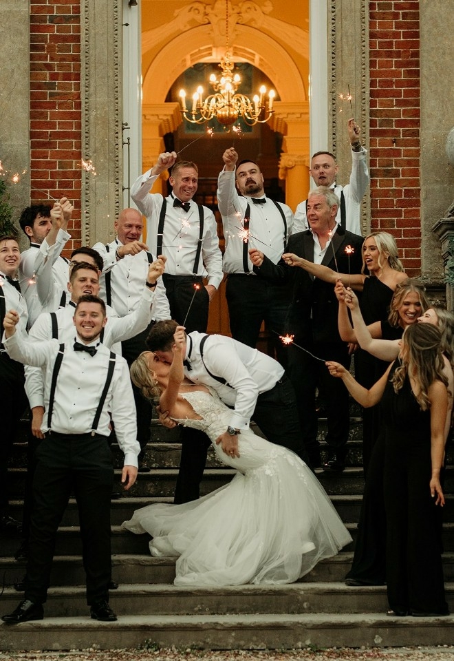 Chloe and Willian celebrating wedding with bridesmaids and groomsmen