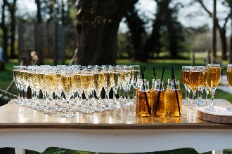 Drinks reception on table outdoors 