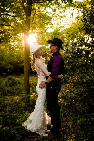 Bride and Groom in woodland clearing