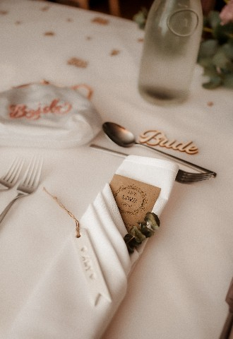 Details from decor for wedding breakfast at Southdowns Manor West Sussex