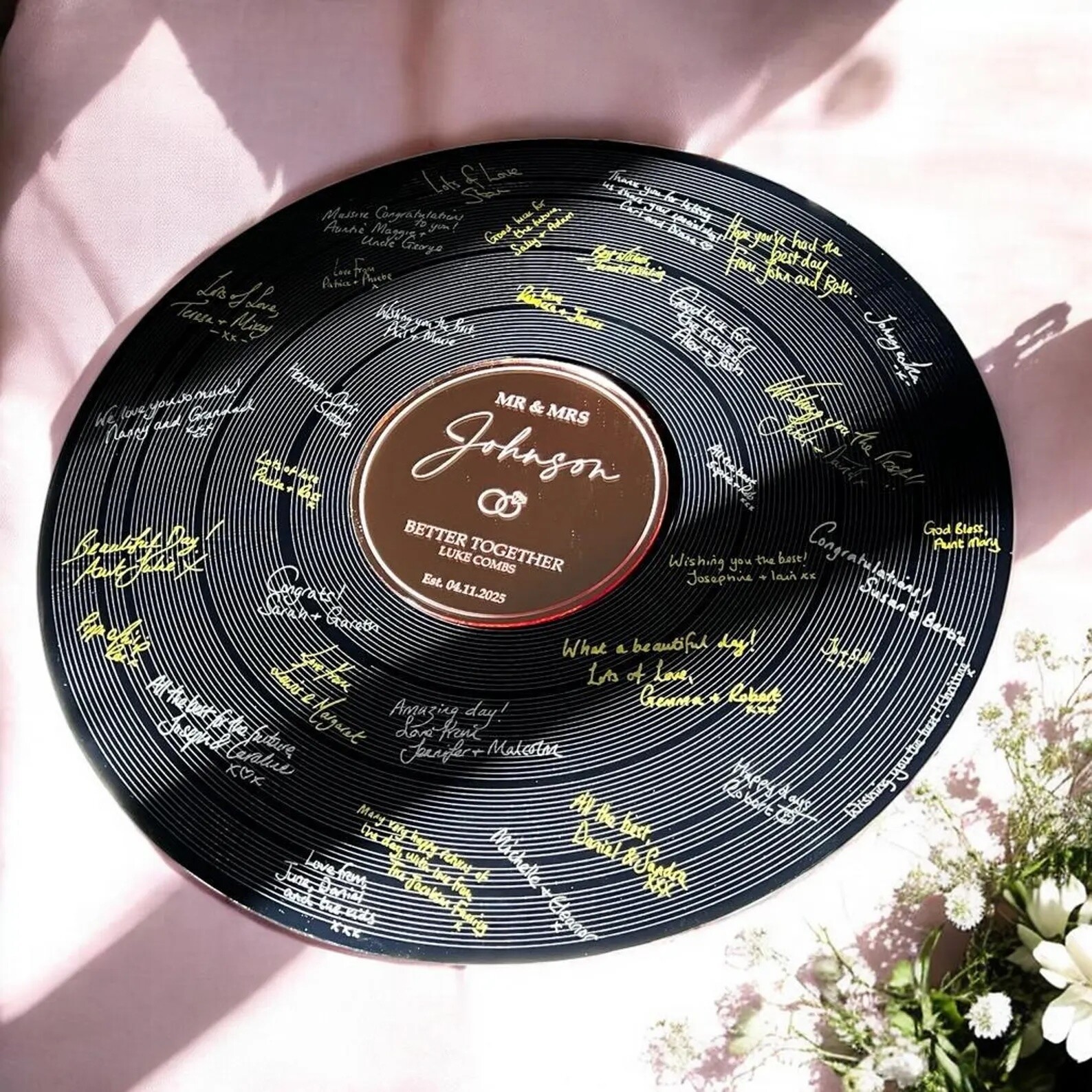 replica LP Record statement wedding guestbook with various guest signatures 