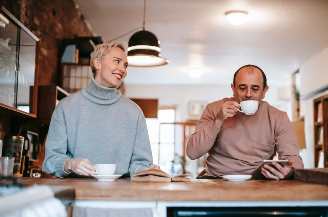 newlyweds drinking coffee together