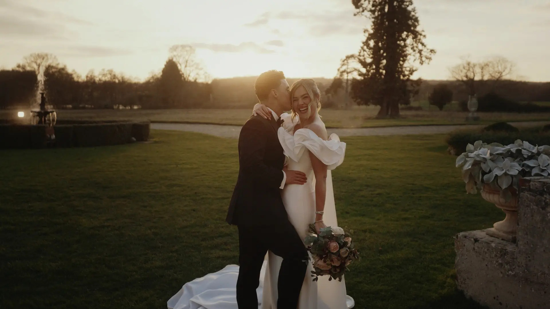 A picture of a married couple in a sunset, taken by Relive the Romance