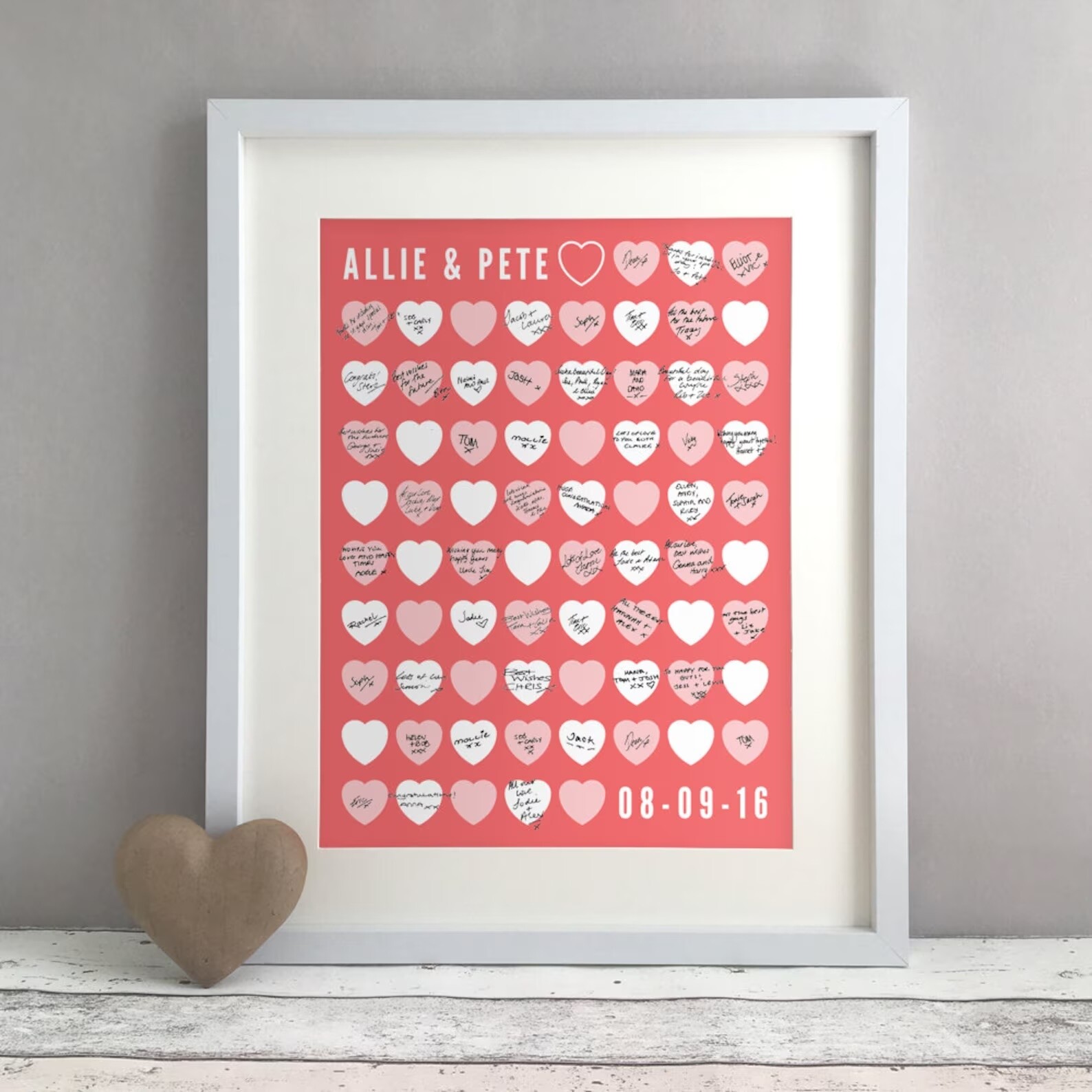 framed print with love hearts repeated in pink, white and red for a wedding guest book alternative