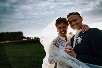 bride and groom in the sunshine