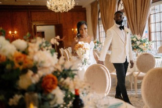 Bride and Groom viewing their reception room at Hedsor House
