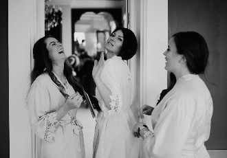 bride and bridesmaids getting ready