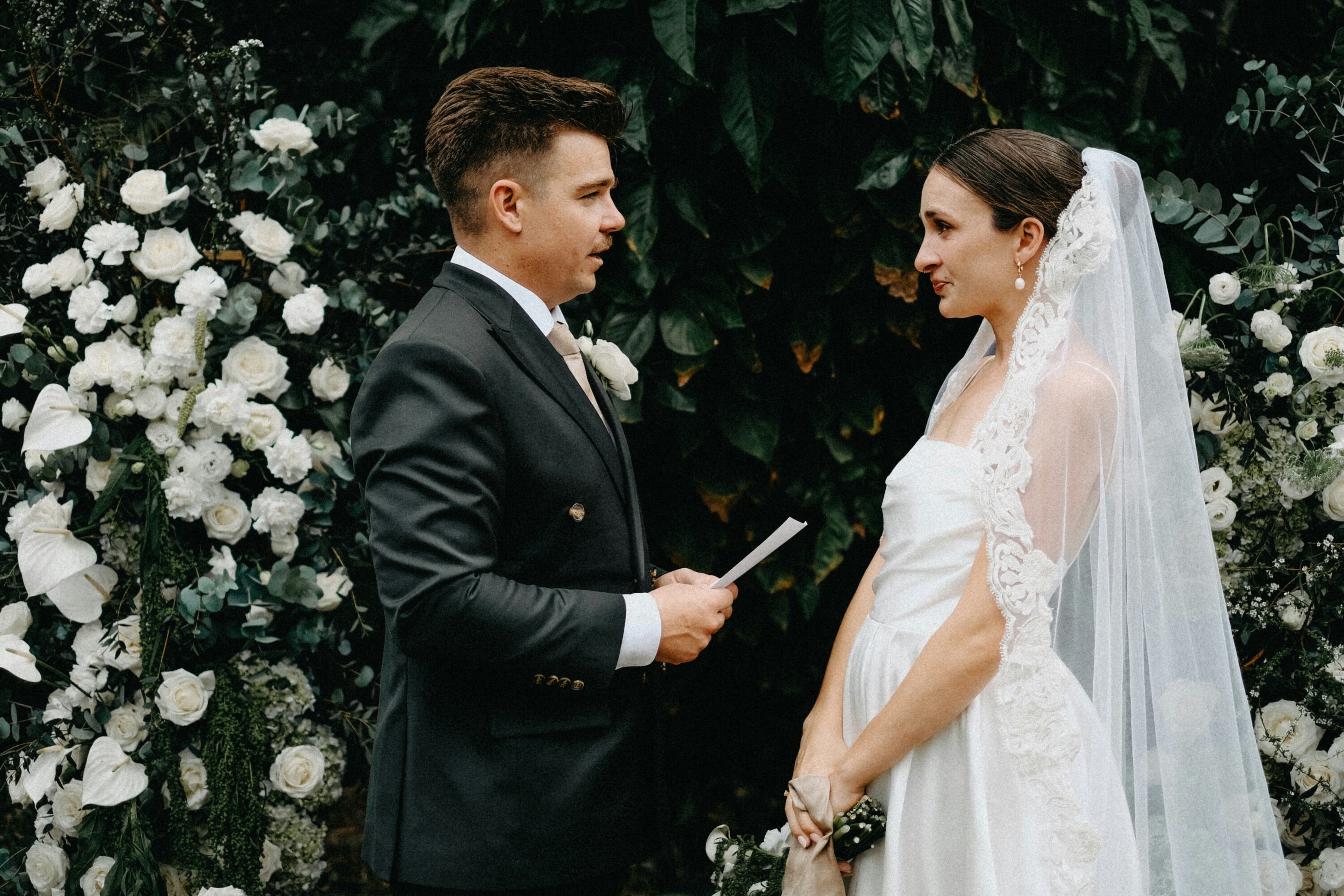 Groom reads out vows during wedding ceremony