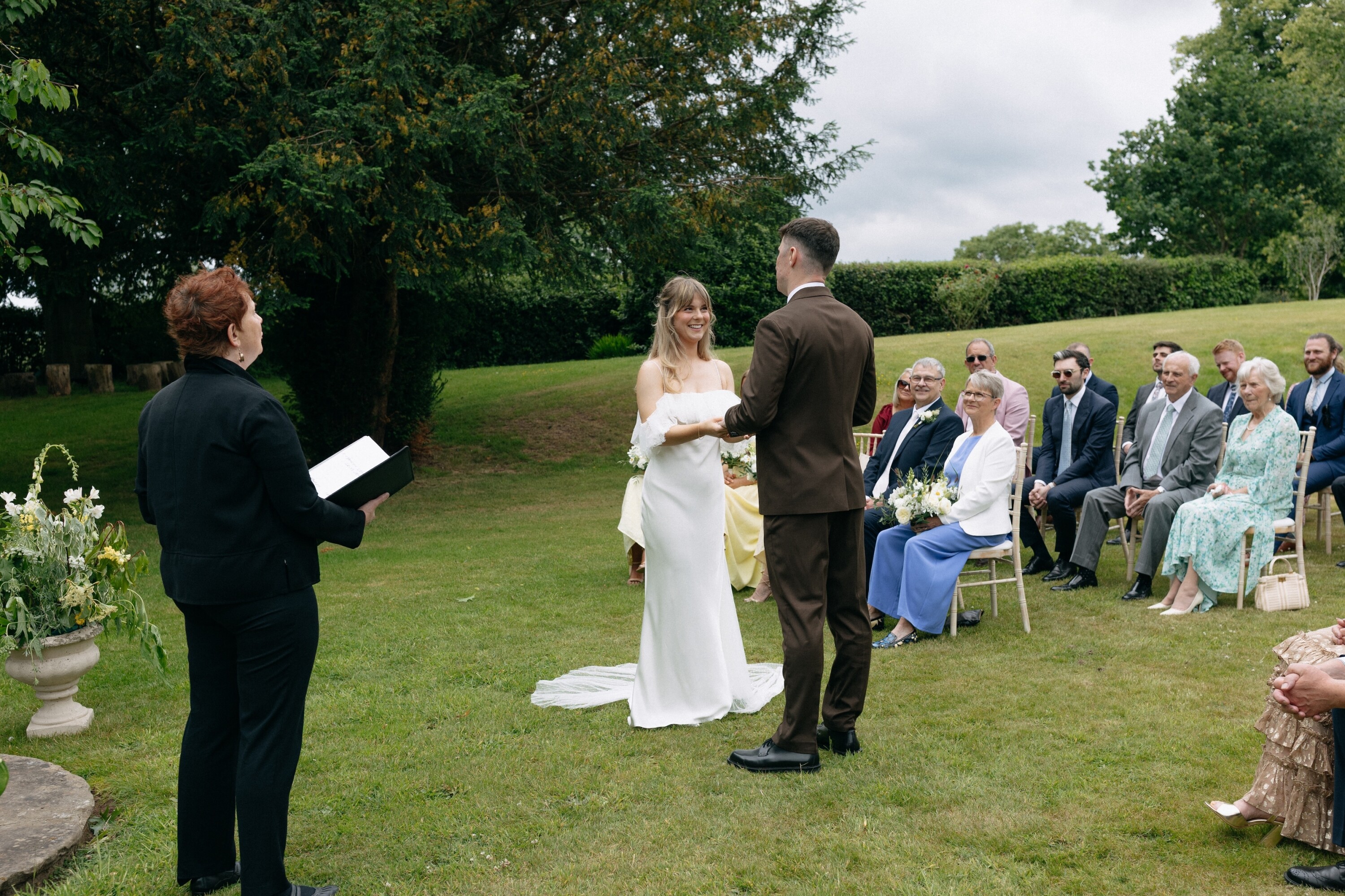 Bride and Groom at their wedding ceremony exchanging vows