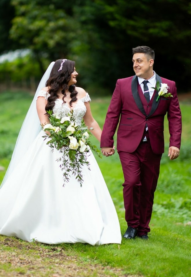 Bride and Groom walking outside at Missenden Abbey