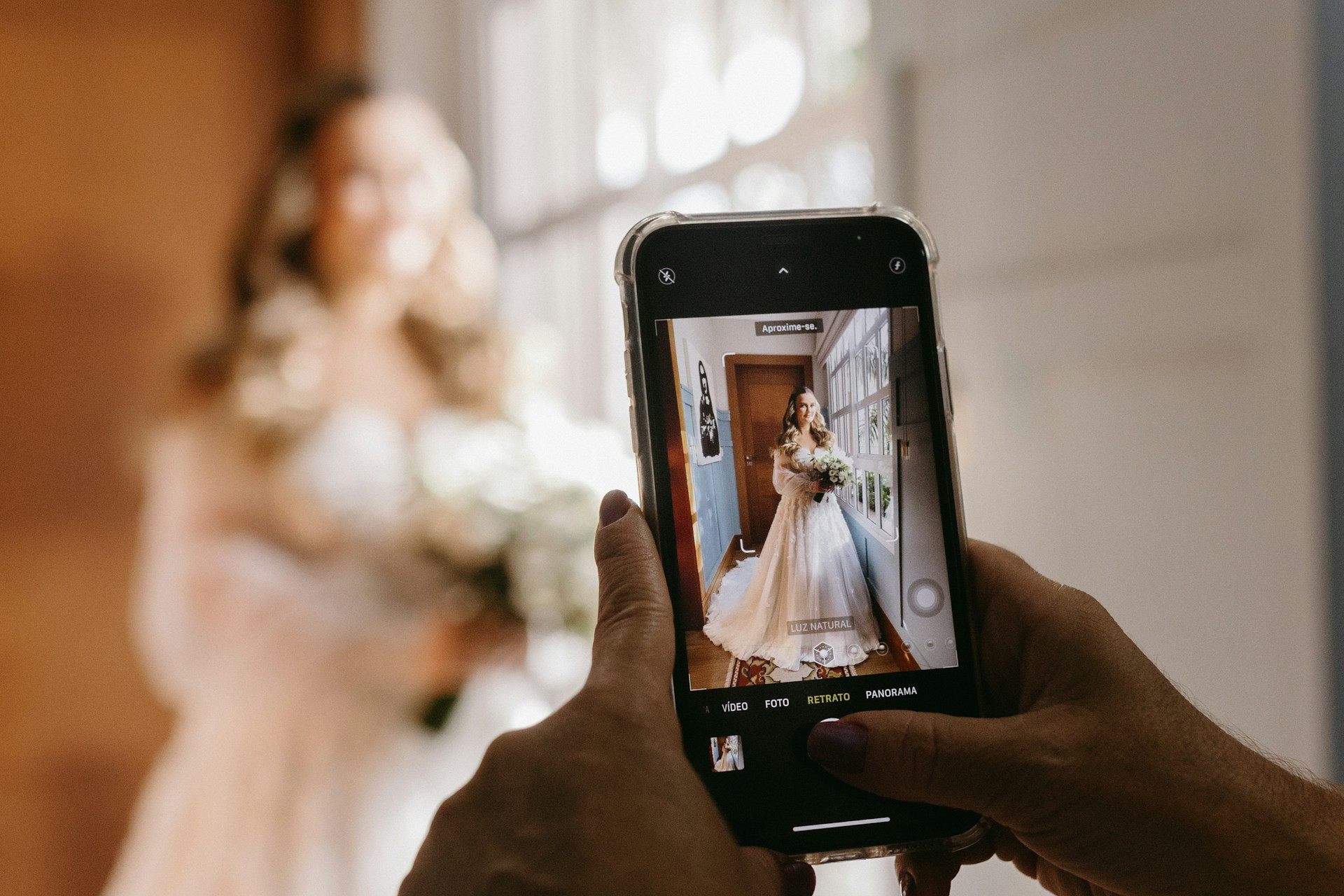 wedding photo on phone of bride