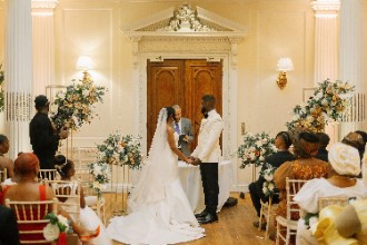 Bride and Groom during wedding ceremony at Hedsor House