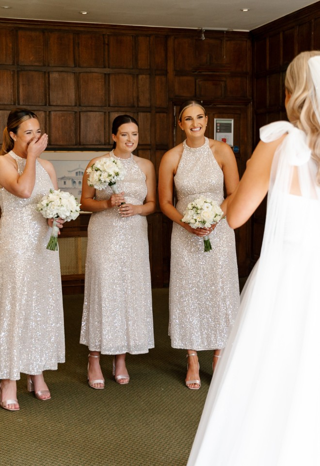 Bridesmaids see bride for the first time