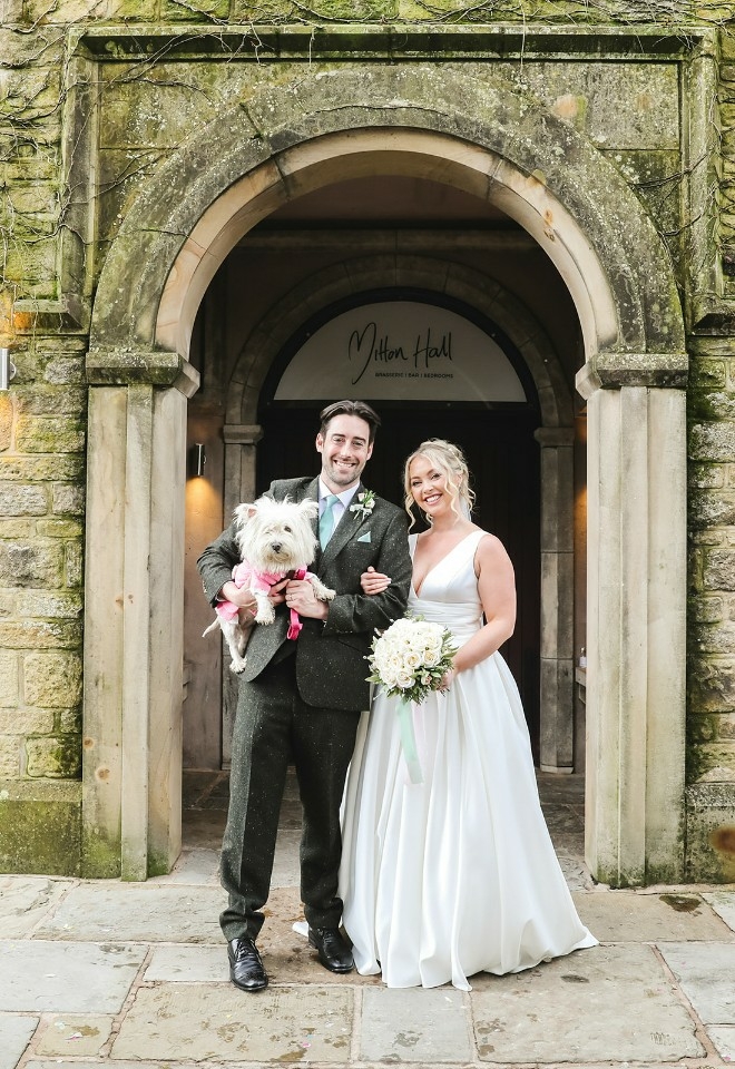 Eric and Faith standing outside of Mitton Hall