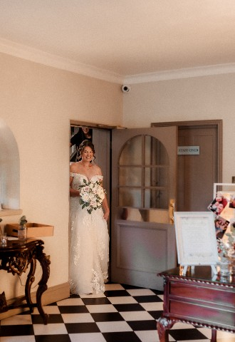 Bride reveal to family at Southdowns Manor West Sussex
