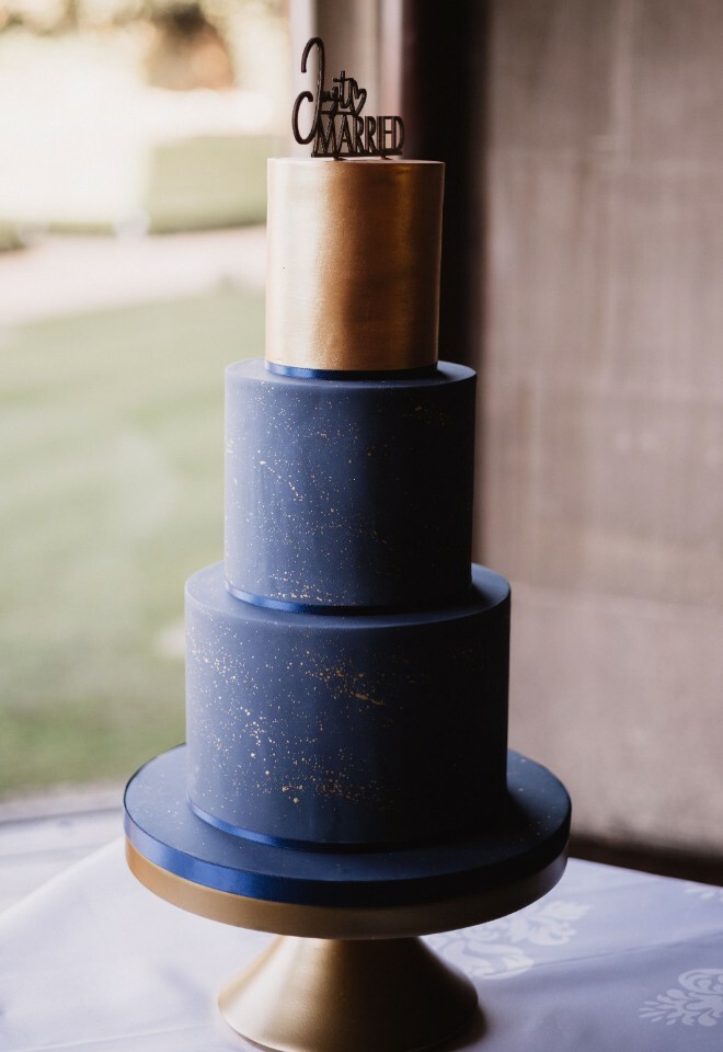 navy and gold wedding cake