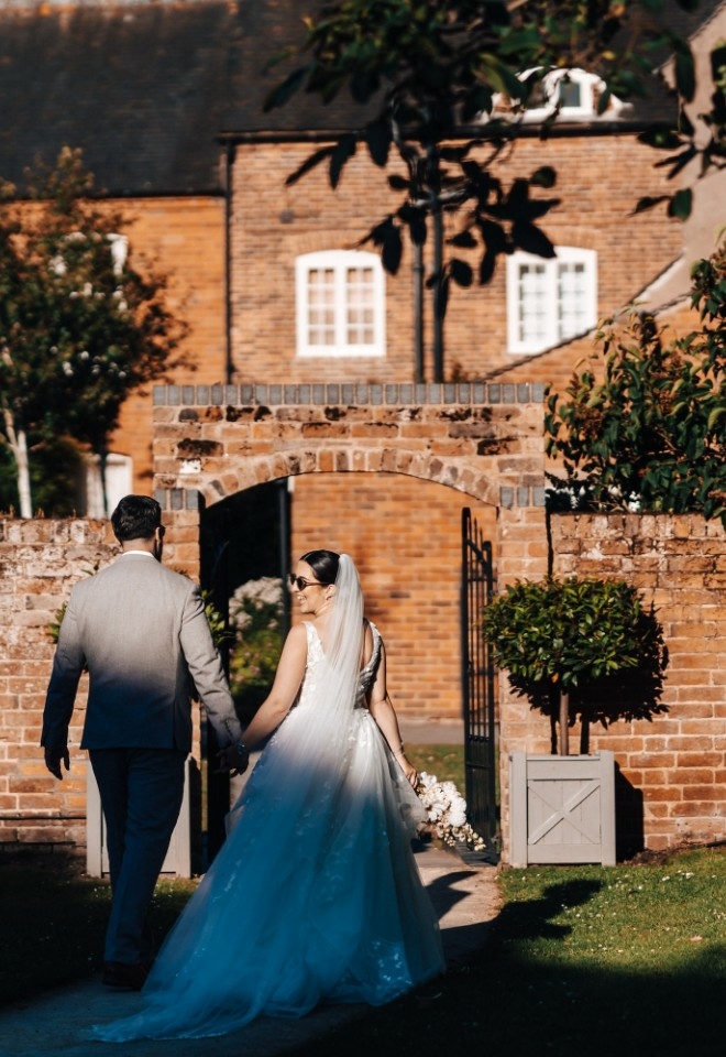 Sophie and Nathan holding hands