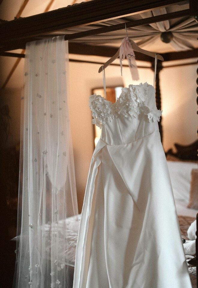 Justin Alexander dress hanging up ready for the bride to get dressed
