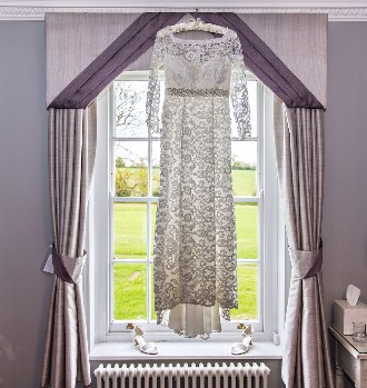 wedding dress hung up