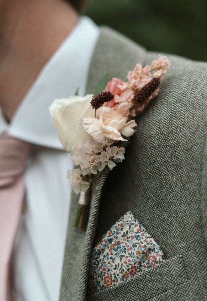 Grooms buttonhole and floral patterned pocket square