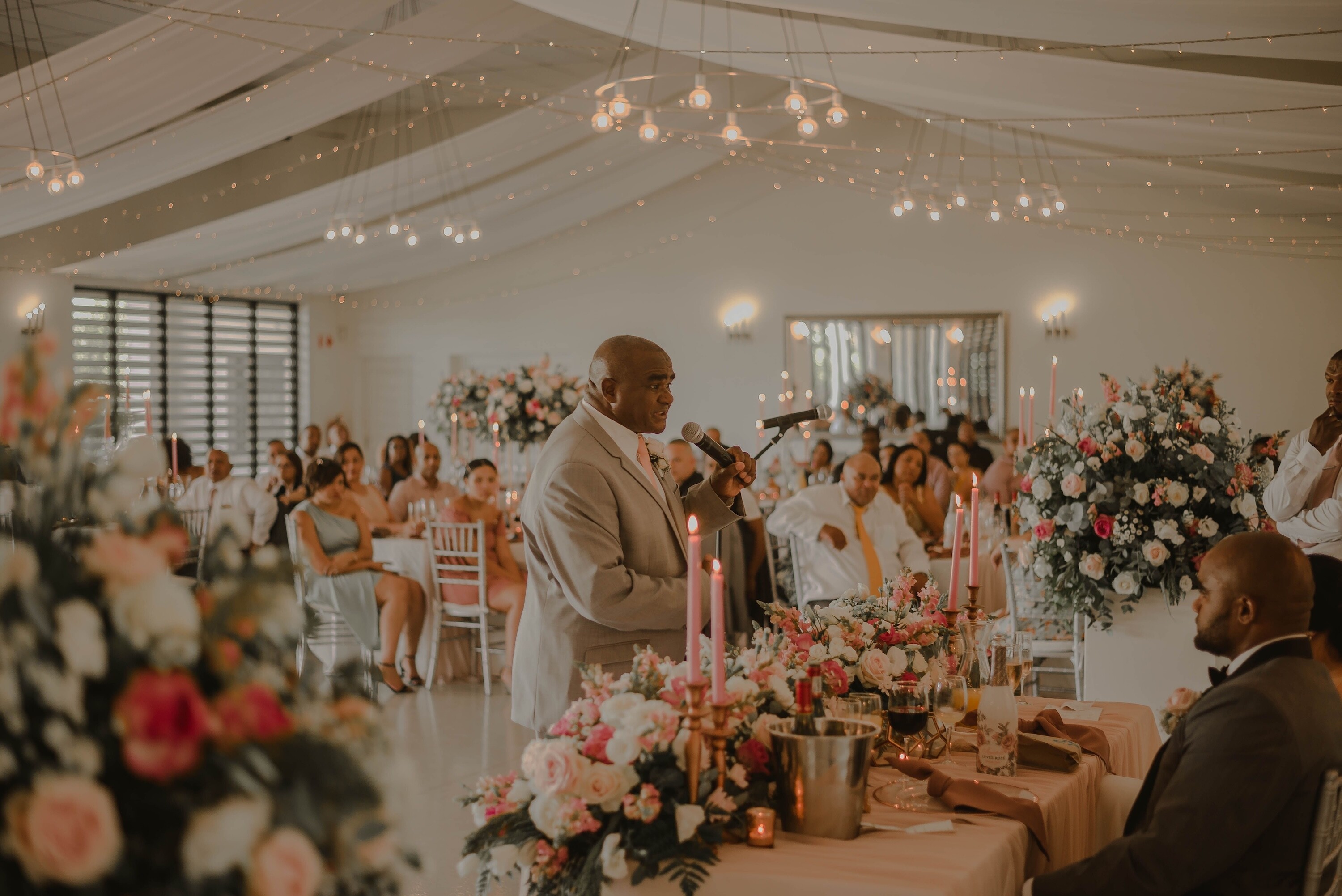 Father of the bride gives a speech during wedding reception