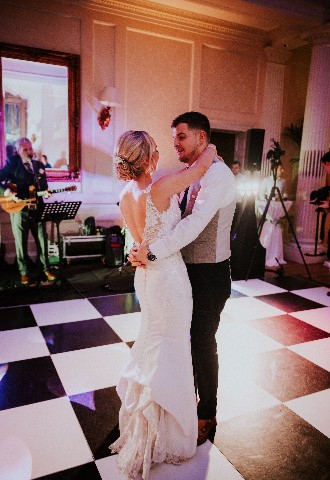 Bride and groom first dance at Hedsor House wedding venue Buckinghamshire