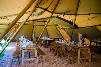 tipi set up for wedding breakfast