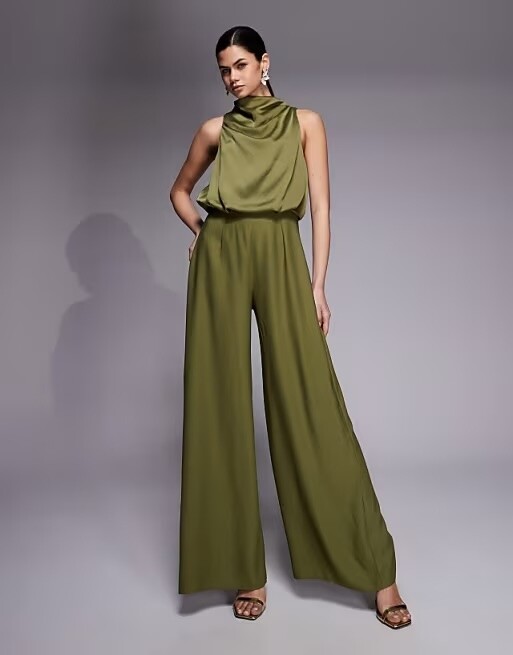 Olive green satin cowl neck bridesmaid jumpsuit with wide-leg trousers for a spring wedding