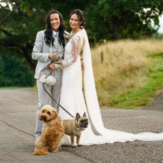 two brides and their two dogs at St Mellion Estate