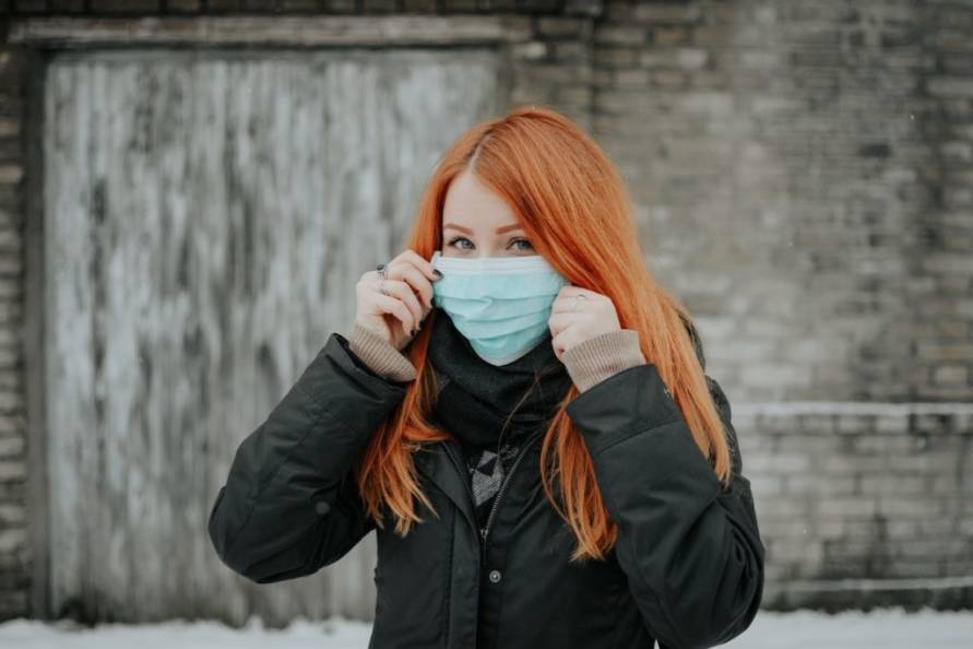 woman wearing face covering