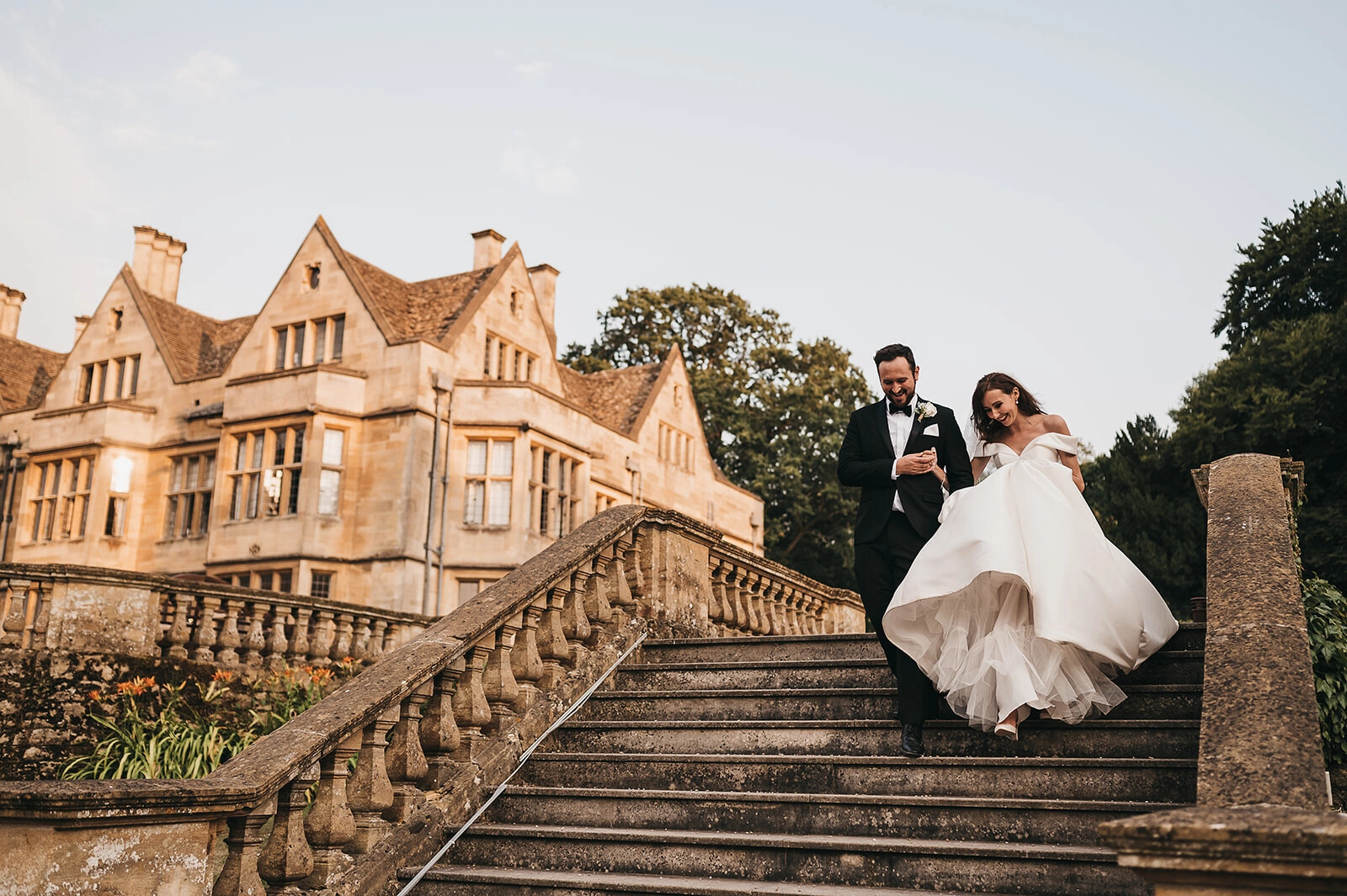 Bride and groom in front of Coombe Lodge