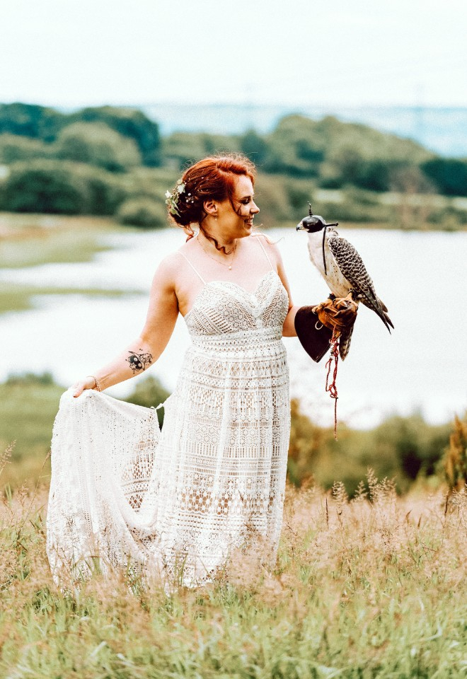 Bride holding a bird 