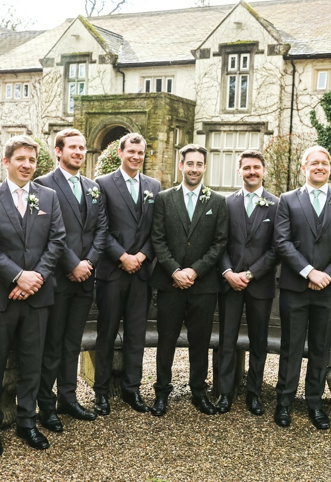 Groom and groomsmen outside of Mitton Hall