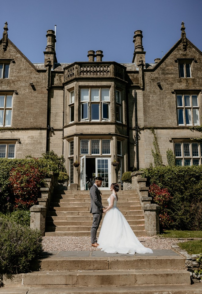 Bride and Groom outside of Falcon Manor