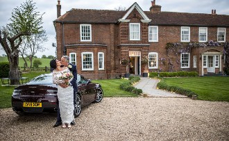 kelly and andy outside Downham Hall