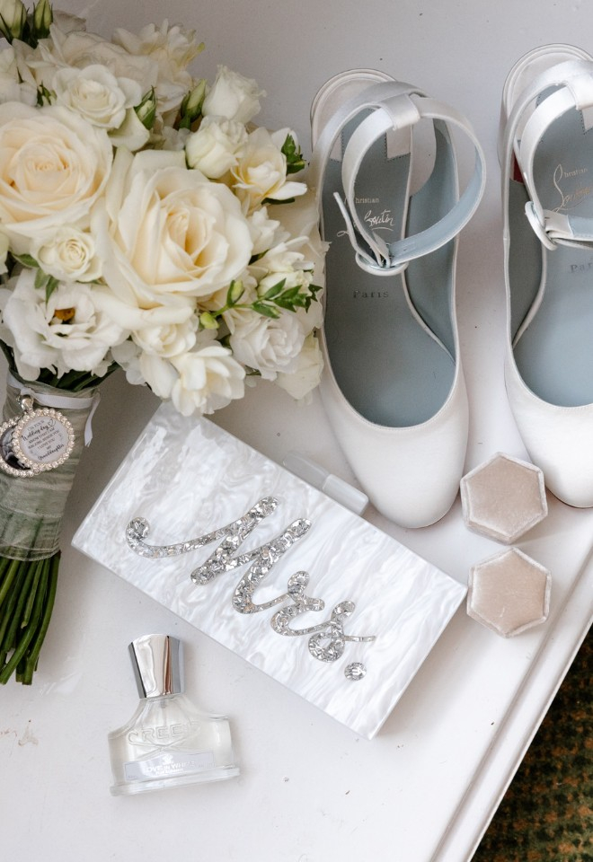 Brides shoes and accessories with bridal bouquet