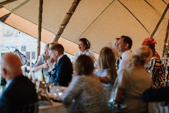 Bride laughs at the speeches