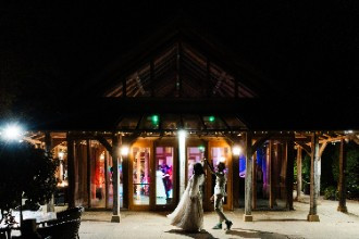 Wedding couple dancing outdoors at night at The Oak Tree of Peover