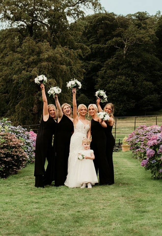 Chloe posing with her bridesmaids