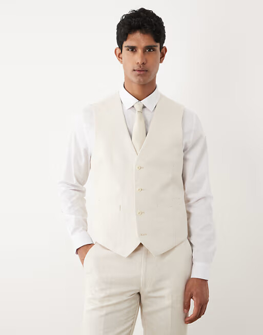 Man wearing white linen waistcoat