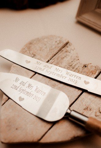 Personalised cake knives for wedding at Southdowns Manor West Sussex