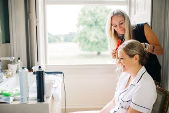 bride having hair done