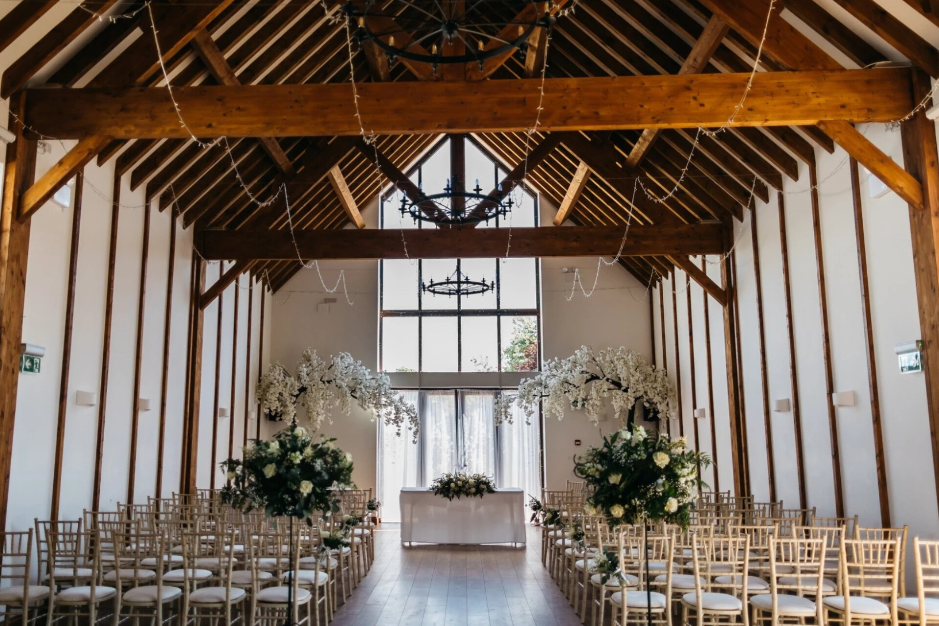 Wedding ceremony set up in the Hay Barn at Winters Tale Country Barn in Buckinghamshire