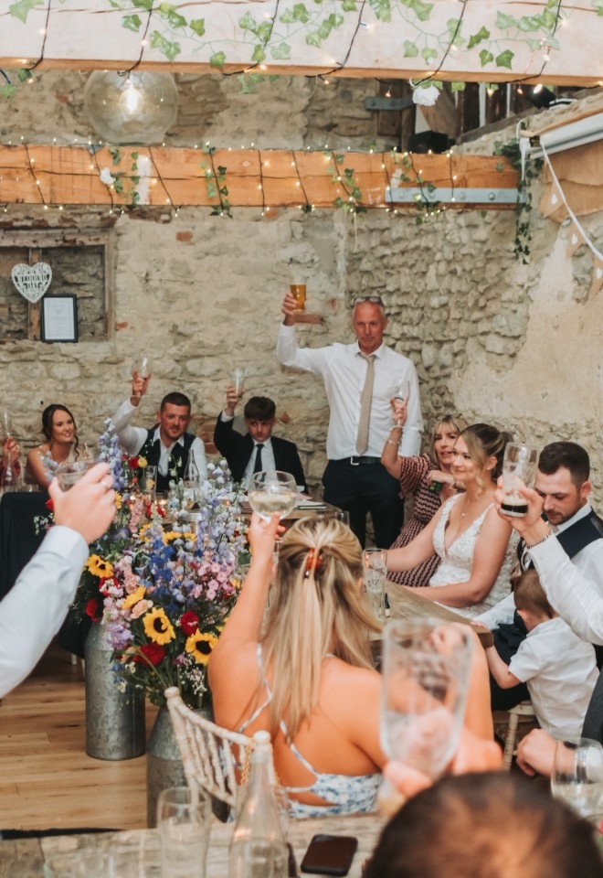 Raising a toast at the wedding