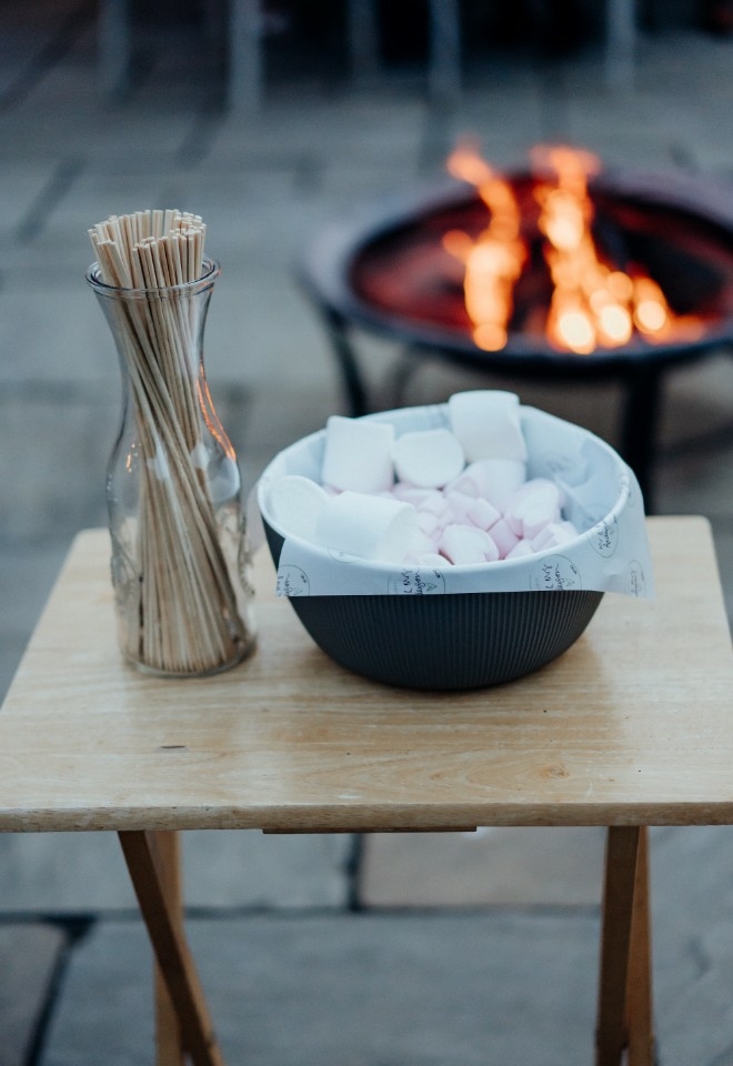 Marshmallows roasting in the fire pit 